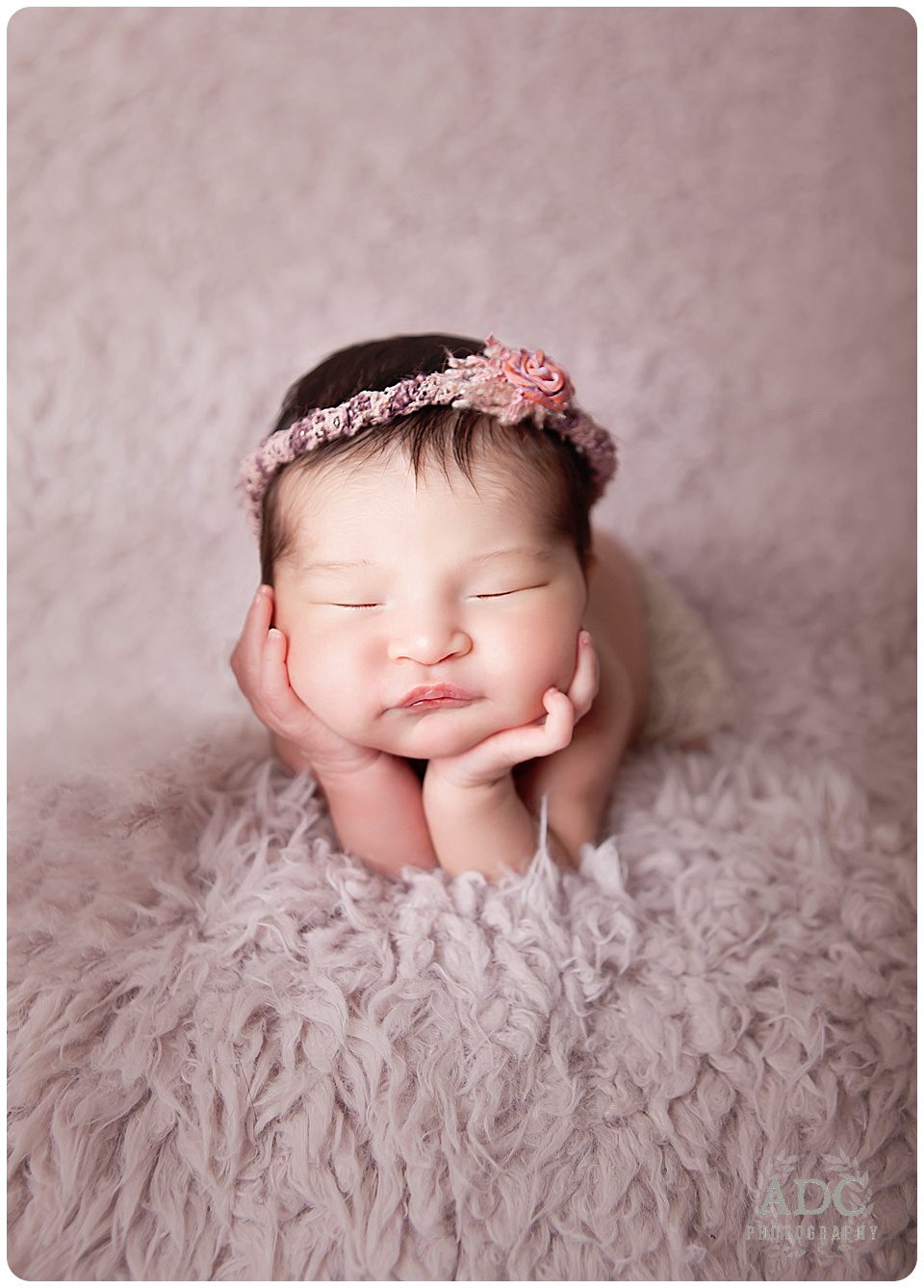 Newborn Photo Head In Hands Pose