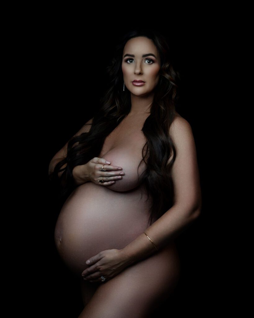 Fine art reclining maternity portrait with reflection